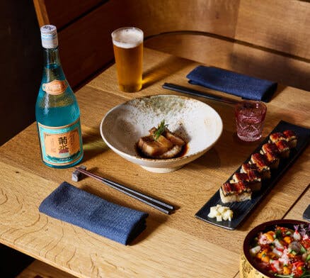 plated sushi on a wooden table