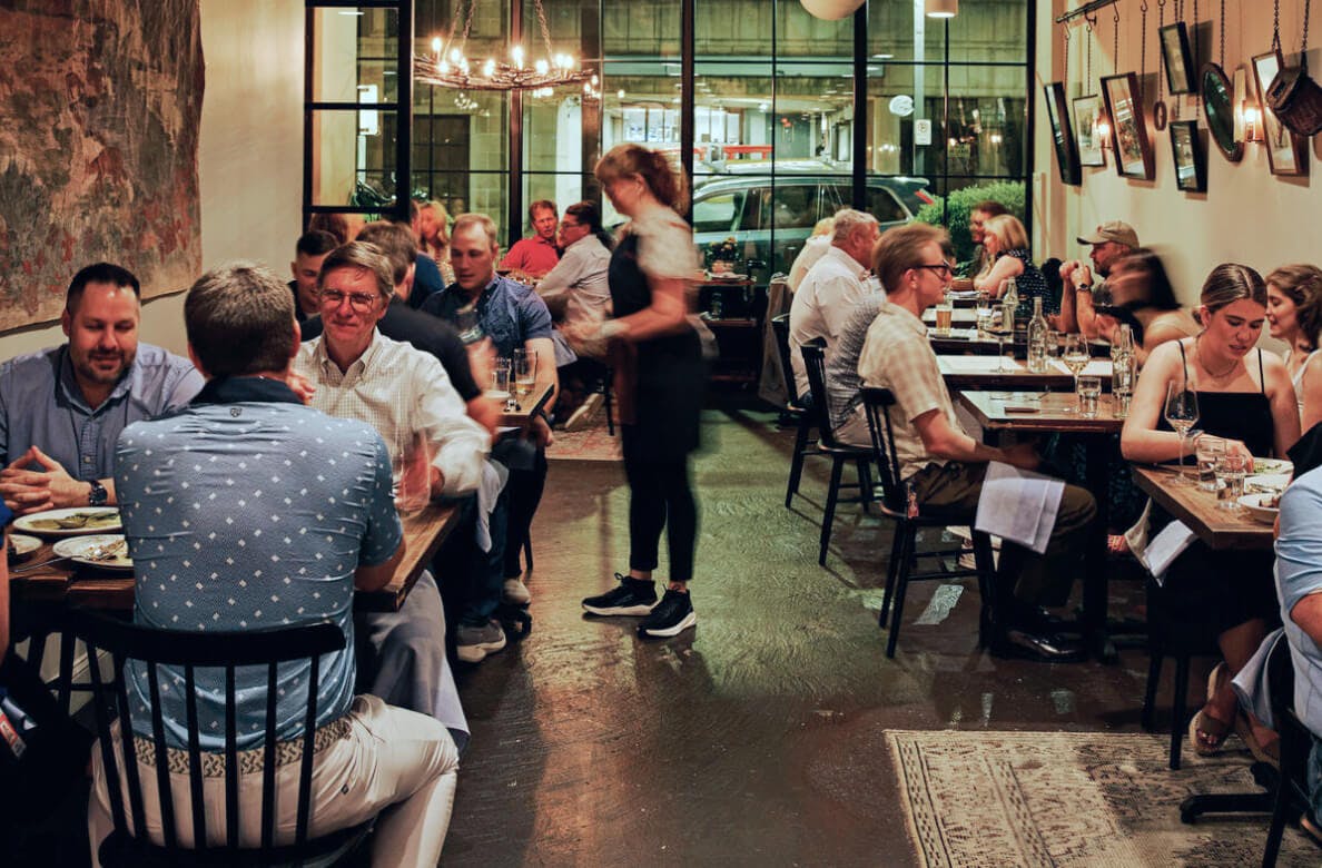 Helen in Birmingham, AL - a small business with a cozy interior filled with diners