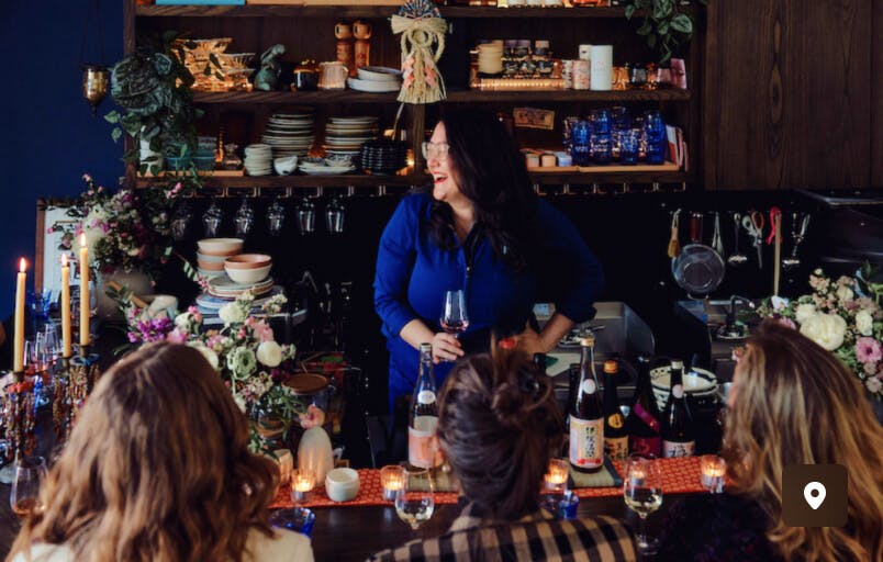 People around a wine bar enjoying drinks and conversation