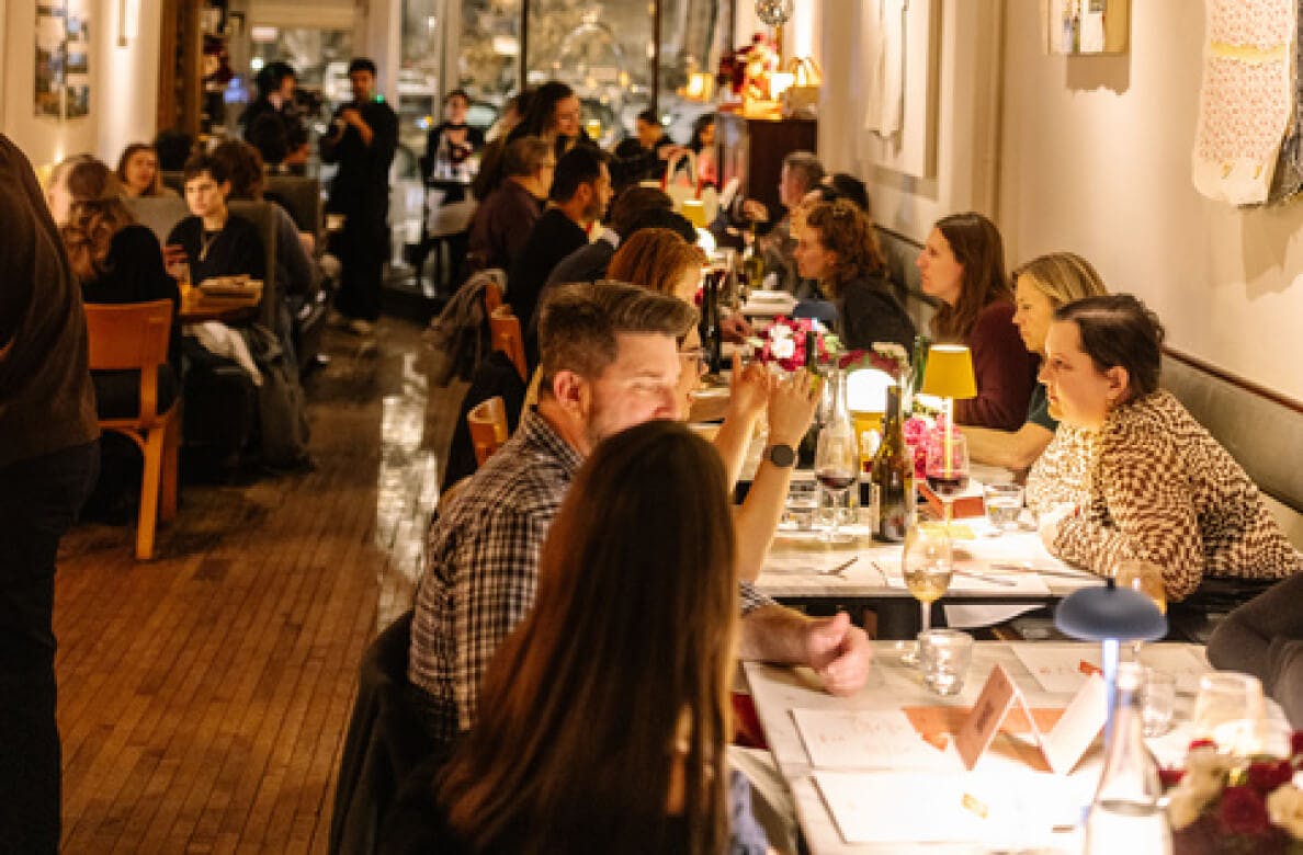 Small Business Saturday event with people dining and interacting