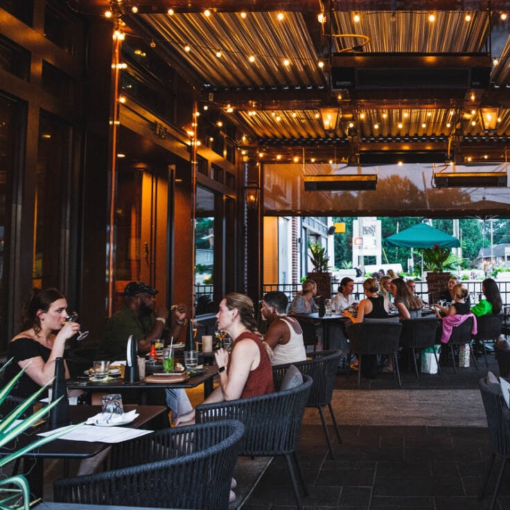 Beautifully interior of restaurant with big open windows at The Crunkleton